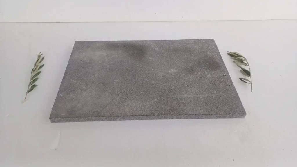 Premium thick-cut black basalt flagstone for luxury estate driveways and permanent patios.