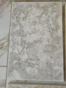 Non-slip antique shellstone pavers surrounding a luxury swimming pool showing superior grip.