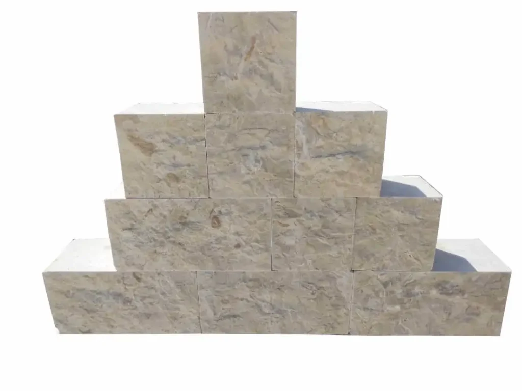 Non-slip white natural stone cobbles with a hand-split surface for maximum grip on outdoor paths.