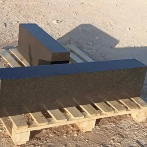 Dark basalt stone landscape edging blocks for garden borders and driveway curbing.