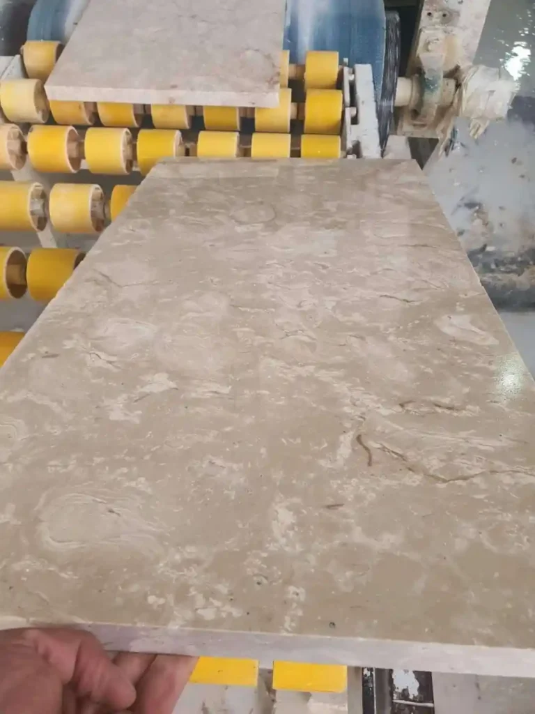 Winding garden walkway made of textured Ocean Reef Shellstone limestone pavers in a coastal landscape setting.