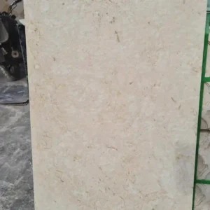 Close-up of the rough textured finish on white outdoor floor tiles for non-slip safety in wet areas