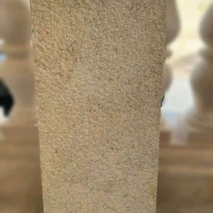 Large format yellow limestone patio tiles in a warm honey-gold palette for an inviting exterior