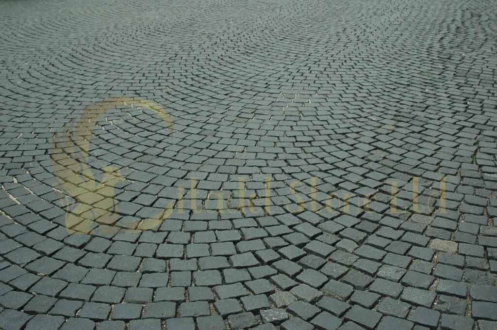 Enhance Your Landscape with Granite Cobblestone Edging by Citadel Stone. A granite cobblestone edging supplier in Arizona and across the United States.