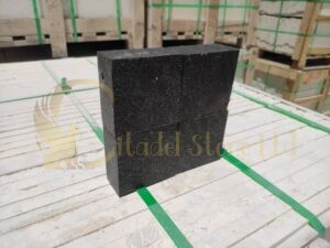 Black cobbles. Basalt stones.