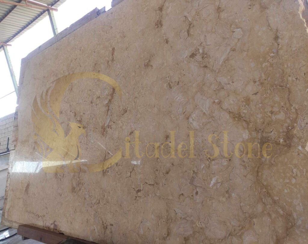 A demonstration of the installation process for yellow limestone tiles.