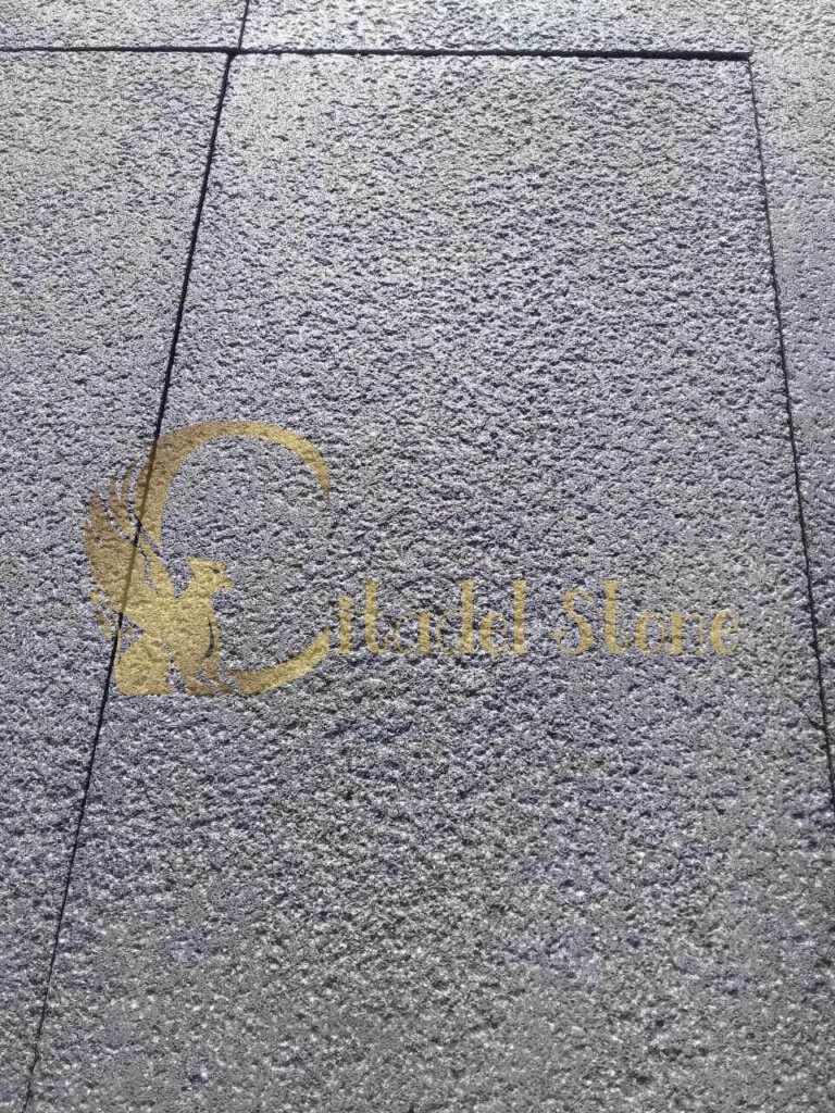 Close-up of black basalt tiles illustrating key features such as texture and finish.