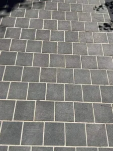 Bush-hammered basalt tiles offer a unique textured look while providing exceptional slip resistance, ideal for bathrooms, kitchens, and even outdoor spaces.