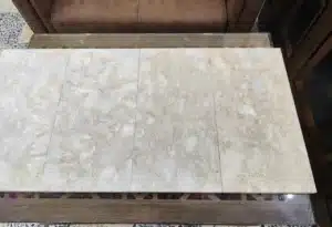 Modern patio design with Ocean Reef Pavers and natural stone accents