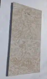 Sophisticated driveway and walkway design with Ocean Reef Pavers and granite accents