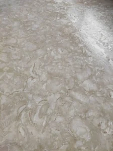 A photo comparing high-quality and low-quality Shellstone pavers side by side