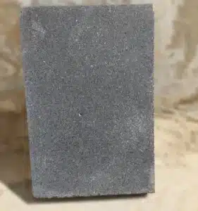 Spreading base material for basalt pavers