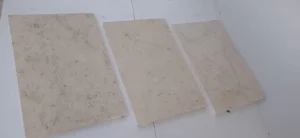 Glossy white limestone tile surface