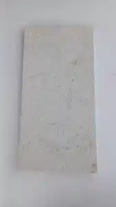 White limestone slab flooring in living room