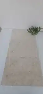 White limestone slabs on a large floor