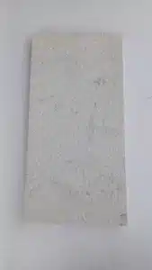 White limestone tiles in entryway