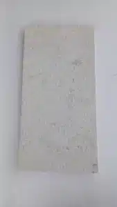 Installing white outdoor pavers on a patio