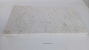 Close-up view of limestone tile surface