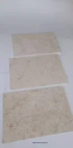 Applying sealant to limestone tiles
