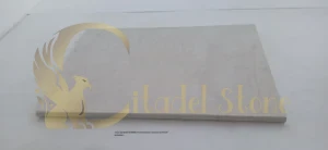 Close-up detail of White Pearl Limestone texture and fossil inclusions