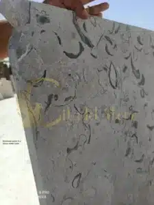 Limestone pavers in a snowy winter scene