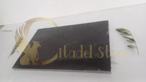 Crew installing basalt pavers