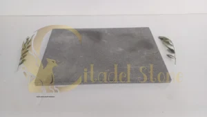 Basalt pavers beside sandstone