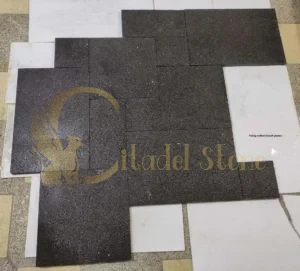 Fixing settled basalt pavers