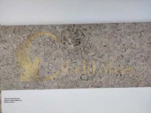 Close-up of natural fossil limestone tiles installed on a living room floor