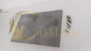 Basalt paver path in sunlight