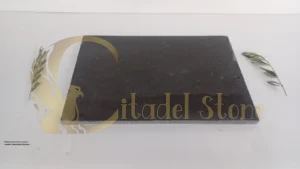 Sleek basalt pavers used in a modern, heavy-duty driveway