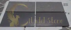 Pristine paver patio in a lush tropical garden