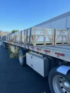 A container ship delivering stone to a remote island