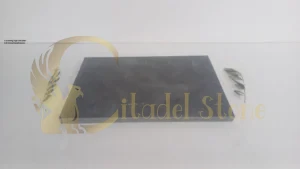 A stunning, high-end patio with honed basalt pavers