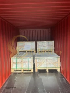 A large container ship carrying imported building materials