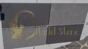 A clean and well-maintained paver patio in a tropical setting