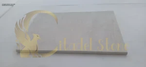 An elegant bathroom with white limestone floor and wall tiles