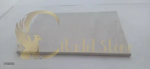 A perfectly laid limestone tile on a prepped subfloor