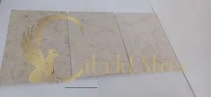  pristine pool deck made with white limestone pavers