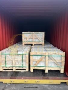 A pallet of white limestone pavers ready for site delivery