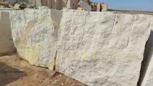 A quarry wall showing horizontal geological strata layers
