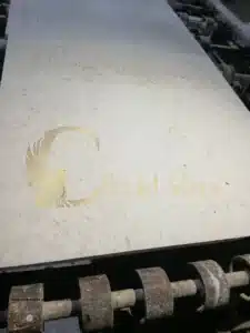 A newly finished white shellstone paver driveway