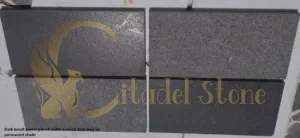 This image illustrates a strategic design choice for incorporating dark stone.