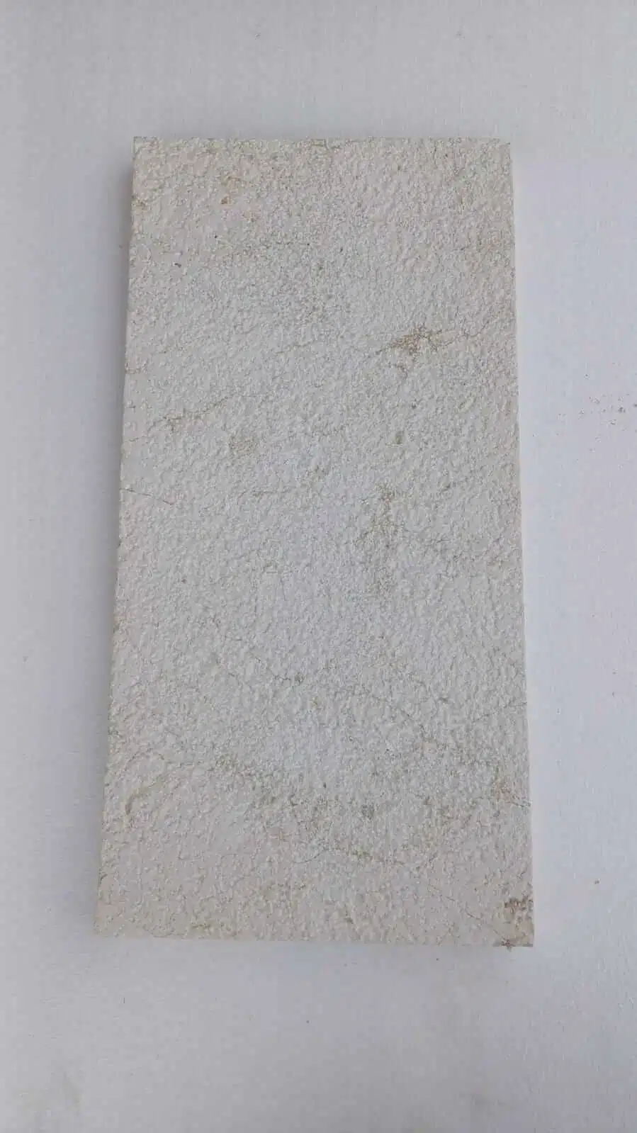 Bluestone Supply LLC Arizona services displayed in a textured stone sample.-img1