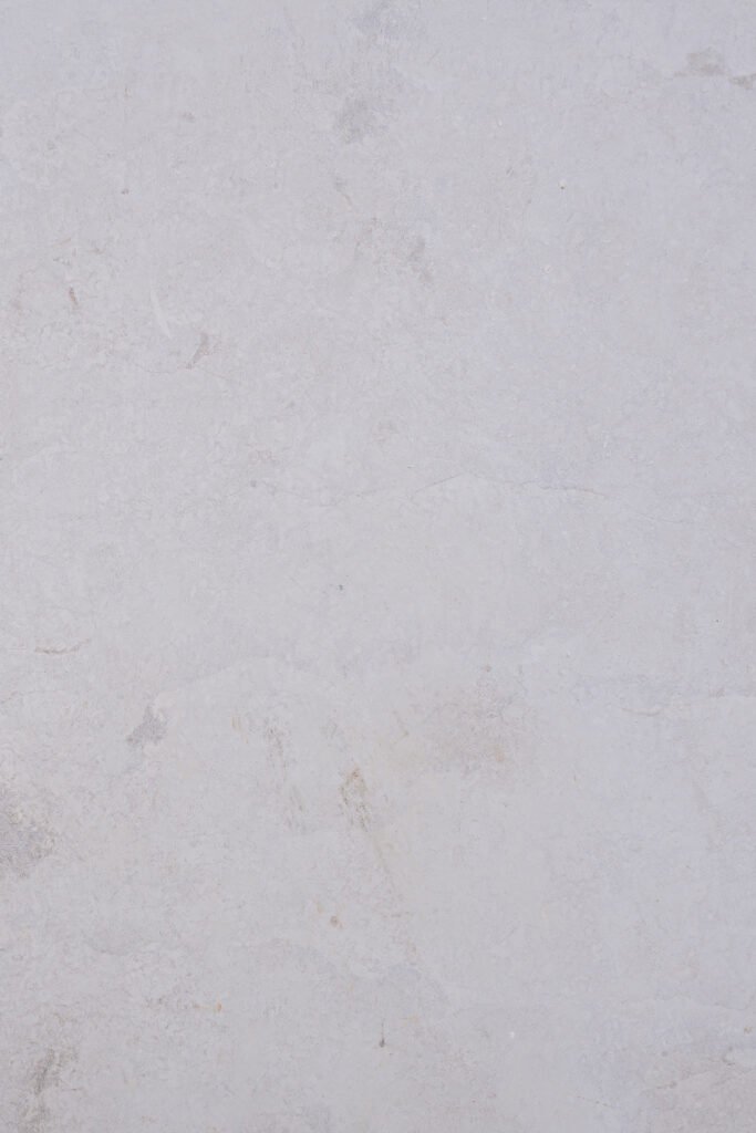 Close-up of pearl white limestone natural finish surface texture