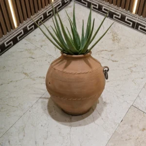 Crema Aurora cream limestone pavers with brown and grey veining in a fine brushed matte