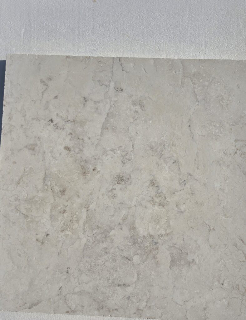 Silk-matte surface of 120 grit honed limestone