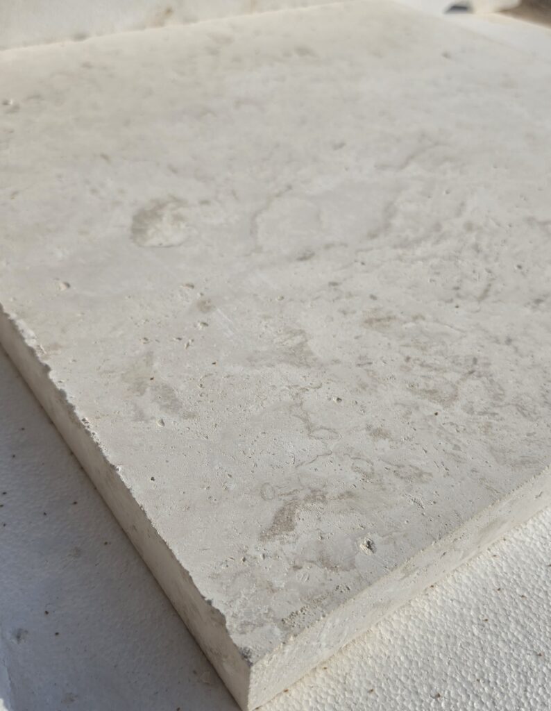 Corner of a 60 grit honed limestone slab