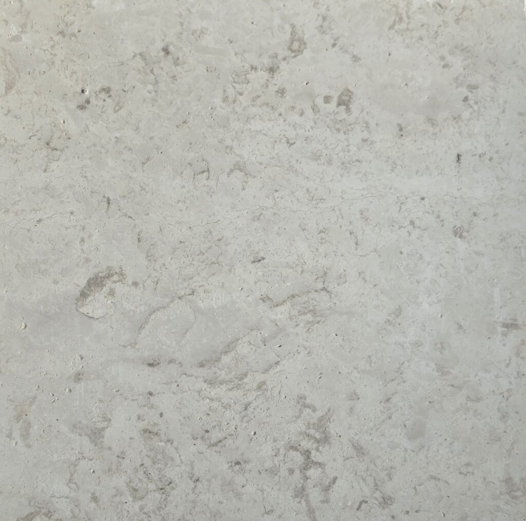 Detail of honed 60 grit limestone finish