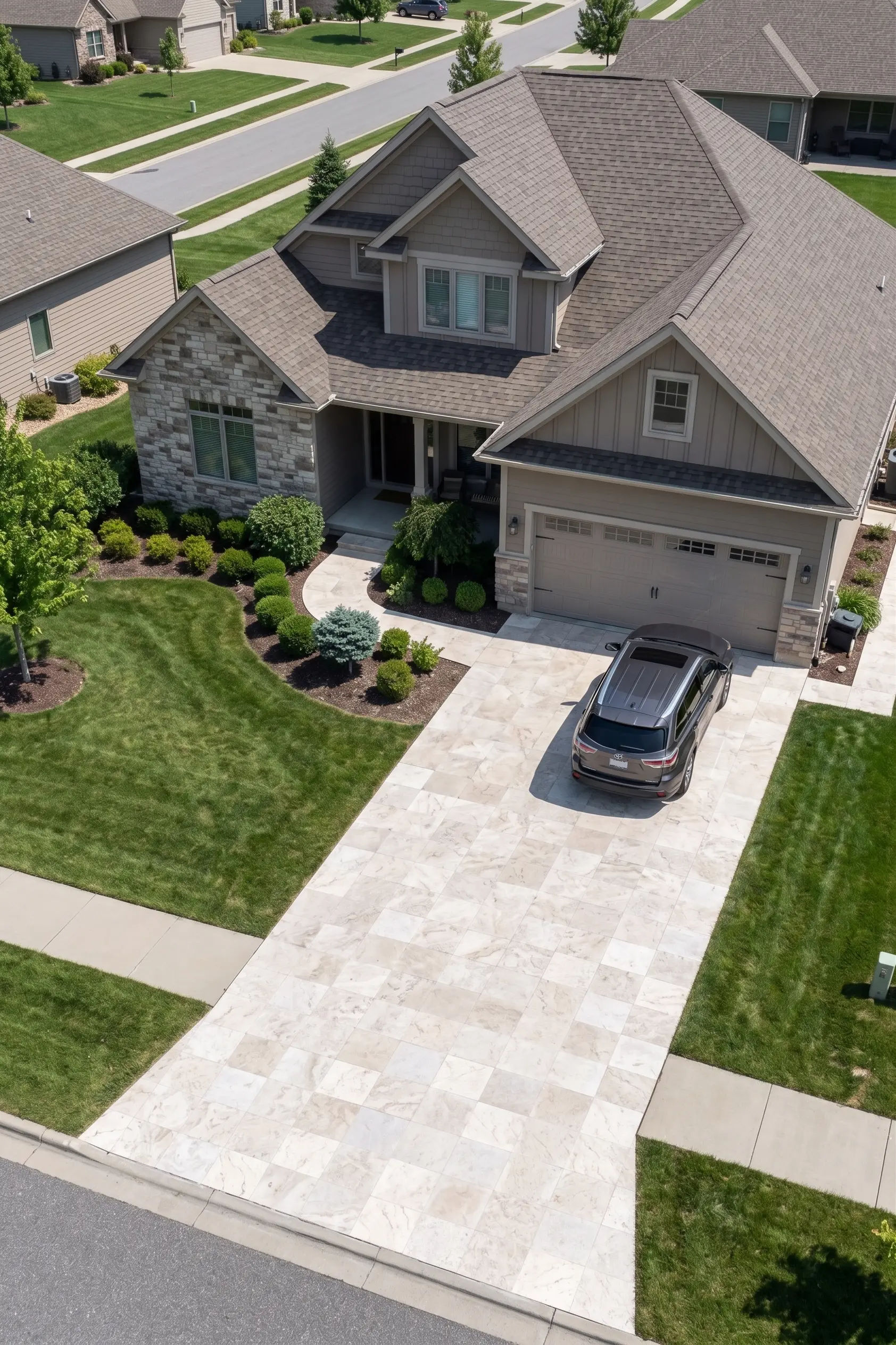Elegant travertine pavers driveway with a modern SUV parked on the surface, relevant to large travertine slabs.